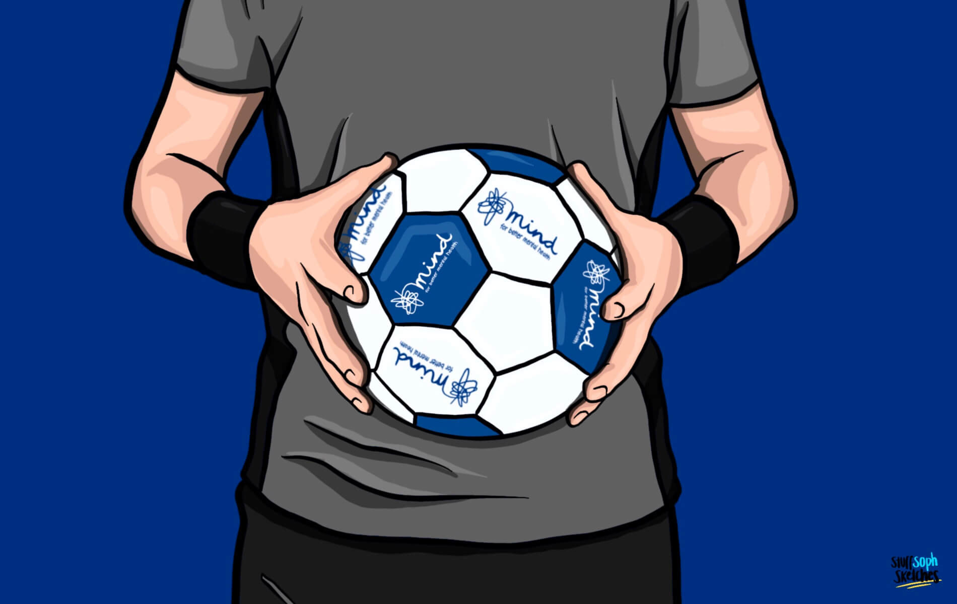 Man holding football with mind sponsor